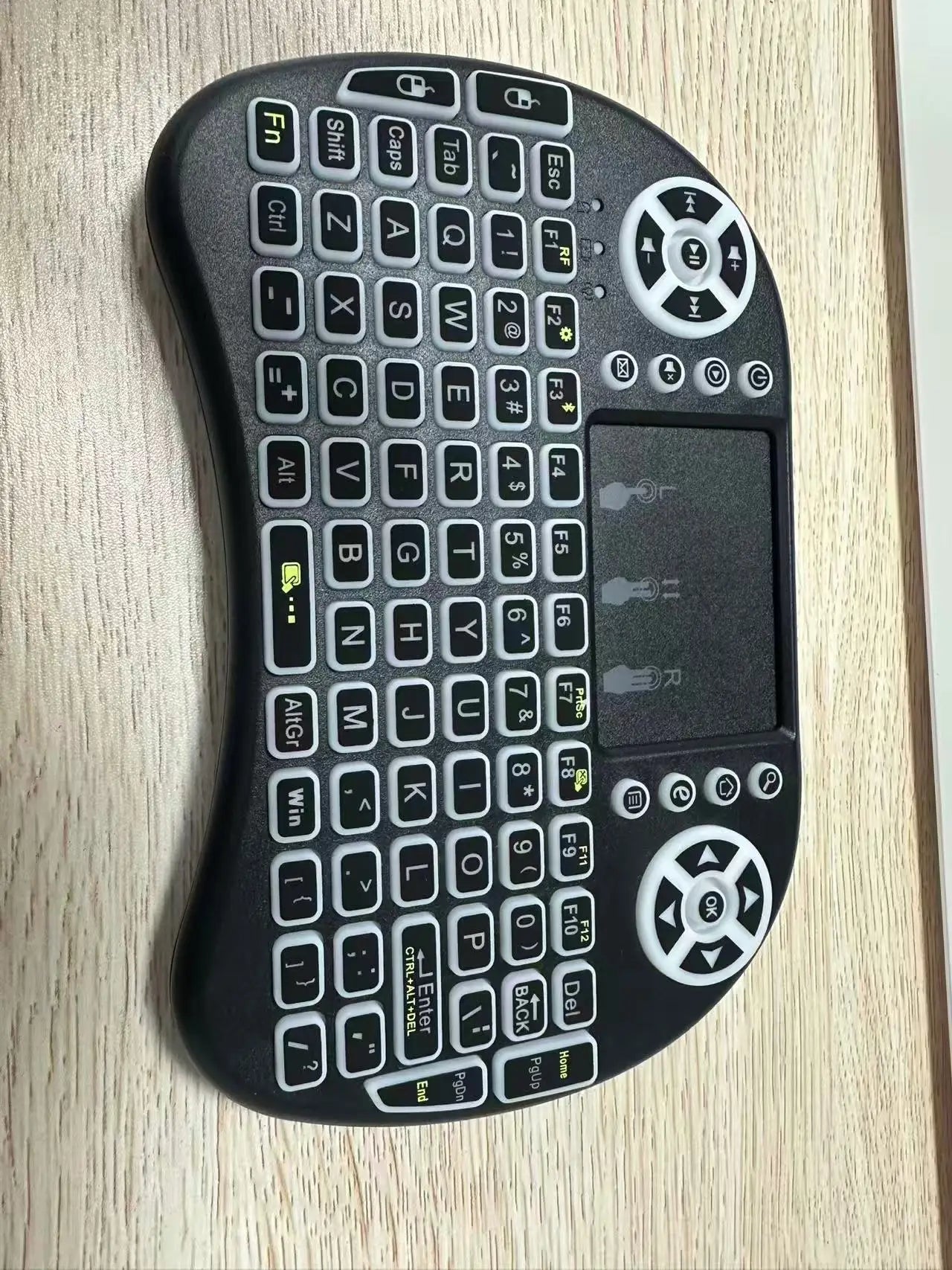 Compact Wireless Keyboard with Touchpad and Remote Control Function