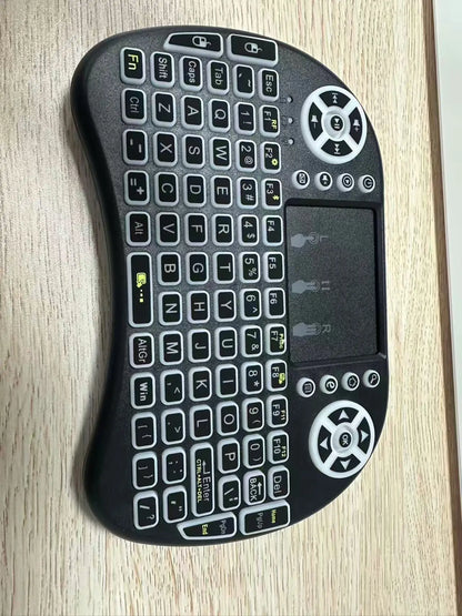 Compact Wireless Keyboard with Touchpad and Remote Control Function